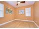 Bedroom with bamboo flooring and neutral walls at 6801 Lockington Ct, Tampa, FL 33625