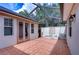 Covered patio with terracotta tile flooring at 6801 Lockington Ct, Tampa, FL 33625