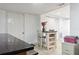 Basement with small kitchen island and ample storage space at 8816 Ascot Ct, Tampa, FL 33634