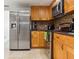 Kitchen with stainless steel appliances and light wood cabinets at 8816 Ascot Ct, Tampa, FL 33634