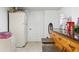 Basement kitchen with granite countertops and additional cabinetry at 8816 Ascot Ct, Tampa, FL 33634