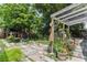 Large backyard with a variety of plants and trees at 8816 Ascot Ct, Tampa, FL 33634