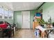 Backyard with a door leading outside and plants at 8816 Ascot Ct, Tampa, FL 33634