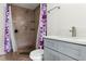 Bathroom features granite shower walls and modern vanity at 8816 Ascot Ct, Tampa, FL 33634