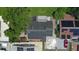 Aerial view of property showing a home with solar panels and a large backyard at 8816 Ascot Ct, Tampa, FL 33634
