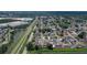 Property's aerial view shows its location in a residential neighborhood at 8816 Ascot Ct, Tampa, FL 33634
