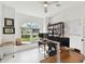 Spacious office with dual workspaces and window seat at 5709 E Longboat Blvd, Tampa, FL 33615