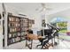 Home office with built-in shelving and large window at 5709 E Longboat Blvd, Tampa, FL 33615
