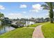 Brick pathway leads to community dock and boat slips at 5709 E Longboat Blvd, Tampa, FL 33615