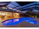 Enjoy evenings by the illuminated pool and spa under the covered patio at 5709 E Longboat Blvd, Tampa, FL 33615