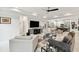 Open concept living room with views into the kitchen at 5709 E Longboat Blvd, Tampa, FL 33615