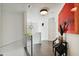 Bright hallway with glass railings and modern artwork at 5709 E Longboat Blvd, Tampa, FL 33615
