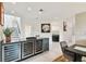 Convenient laundry room with washer, dryer, and ample storage at 5709 E Longboat Blvd, Tampa, FL 33615