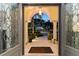 Elegant entryway with arched doorway and stained-glass details at 5709 E Longboat Blvd, Tampa, FL 33615