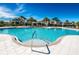 Relaxing community pool with plenty of lounge chairs at 11329 Emerson Lake Dr, Riverview, FL 33578