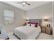Spacious bedroom with a queen bed and neutral decor at 11329 Emerson Lake Dr, Riverview, FL 33578