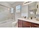 Clean bathroom with tub/shower combo and updated vanity at 11329 Emerson Lake Dr, Riverview, FL 33578
