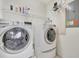 Convenient laundry room with washer and dryer included at 11329 Emerson Lake Dr, Riverview, FL 33578