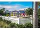 playground with swings and play structures at 11329 Emerson Lake Dr, Riverview, FL 33578