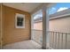 Private balcony with tile flooring and white railing at 11329 Emerson Lake Dr, Riverview, FL 33578