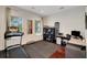 Home office with treadmill and plenty of storage at 11329 Emerson Lake Dr, Riverview, FL 33578