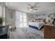Main bedroom with king-size bed and stylish rug at 16308 Gulf Blvd # 209, Redington Beach, FL 33708