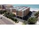 Aerial view of condo building and beachfront parking at 16308 Gulf Blvd # 209, Redington Beach, FL 33708