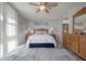 Main bedroom with a king bed and coastal decor at 16308 Gulf Blvd # 209, Redington Beach, FL 33708
