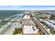 Aerial view of beachfront property with ocean and road at 16308 Gulf Blvd # 209, Redington Beach, FL 33708