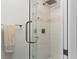 Walk-in shower with glass enclosure at 16308 Gulf Blvd # 209, Redington Beach, FL 33708