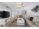 Spacious living room with comfortable seating and coastal decor at 16308 Gulf Blvd # 209, Redington Beach, FL 33708