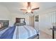 Bedroom with a double bed, dresser, and closet at 9316 Channing Hill Dr, Ruskin, FL 33573