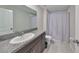 Clean bathroom with shower/tub combo, vanity, and toilet at 9316 Channing Hill Dr, Ruskin, FL 33573