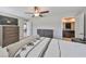 Comfortable bedroom with en-suite bathroom access and built-in dresser at 9316 Channing Hill Dr, Ruskin, FL 33573