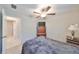 Bedroom with a double bed, dresser, and access to bathroom at 9316 Channing Hill Dr, Ruskin, FL 33573