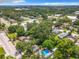 Wide aerial view showing home, pool, and surrounding area at 1751 28Th S St, St Petersburg, FL 33712