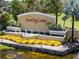 Sun City Center entrance featuring fountains and landscaping at 809 Chipper Dr, Sun City Center, FL 33573