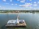 Aerial view of Holmes Beach pier, restaurants and beautiful coastline at 865 N Shore Dr, Anna Maria, FL 34216