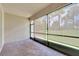 Relaxing screened patio with brick pavers at 16216 Amethyst Key Dr, Wimauma, FL 33598