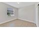 Bright bedroom with wood-look floors and ample closet space at 16216 Amethyst Key Dr, Wimauma, FL 33598
