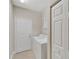 Convenient laundry room with washer, dryer, and storage at 16216 Amethyst Key Dr, Wimauma, FL 33598