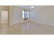 Living room with tile floor and interior access to other rooms at 16216 Amethyst Key Dr, Wimauma, FL 33598