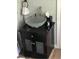 Bathroom with a modern vessel sink and dark vanity at 2905 W Cherry St, Tampa, FL 33607