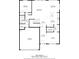 First floor plan showcasing living room, kitchen, and garage access at 16632 Goose Ribbon Pl, Wimauma, FL 33598