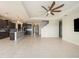 Open and airy Gathering room with tile floors and high ceilings at 16632 Goose Ribbon Pl, Wimauma, FL 33598