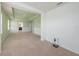 Main bedroom with light green walls and white trim at 16632 Goose Ribbon Pl, Wimauma, FL 33598