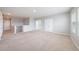 Spacious loft area with neutral carpeting and plenty of natural light at 16632 Goose Ribbon Pl, Wimauma, FL 33598