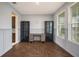 Bright office space with wood-look floors and neutral-toned walls at 16632 Goose Ribbon Pl, Wimauma, FL 33598