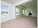 Main bedroom with lake view and ensuite bathroom access at 16632 Goose Ribbon Pl, Wimauma, FL 33598