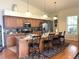 Spacious kitchen with island and hardwood floors at 30737 Elam Rd, Wesley Chapel, FL 33545